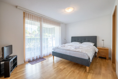 ferienwohnung wagner iseltwald schlafzimmer.webp